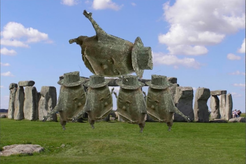 A meme of a potato sculpture on top of Stonehenge