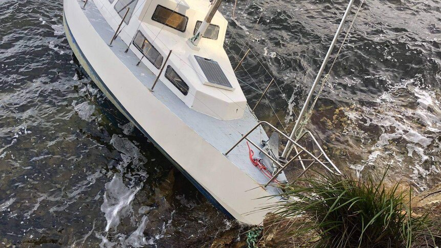 Boat aground off the Tasmanian coast, July 2019.