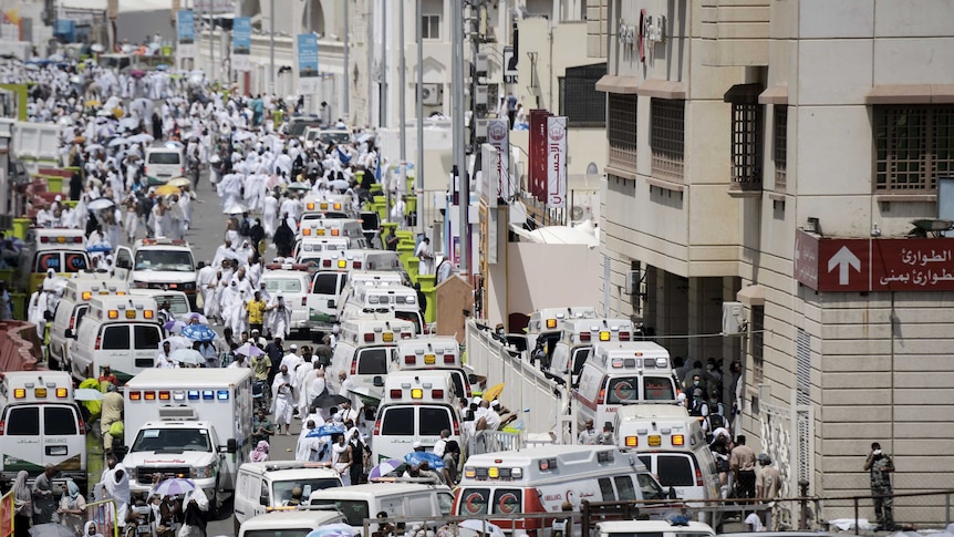 Saudi ambulances arrive with pilgrims who were injured in a stampede at an emergency hospital in Mina Sep 2015