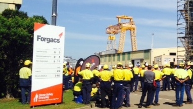 Workers gather at the Forgacs shipyards in Newcastle.