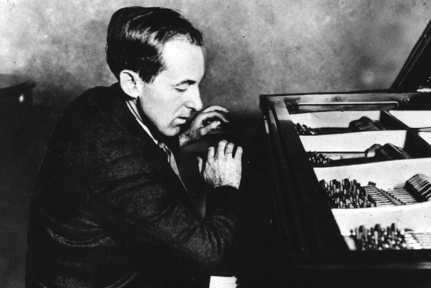 Henry Cowell playing his tone clusters on the piano