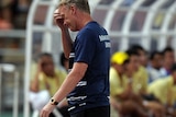 Manchester United manager David Moyes reacts during a match against the Singha All Stars in Bangkok.