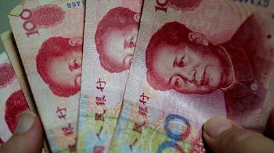 Chinese currency: 100 yuan notes. (Reuters: Reinhard Krause)