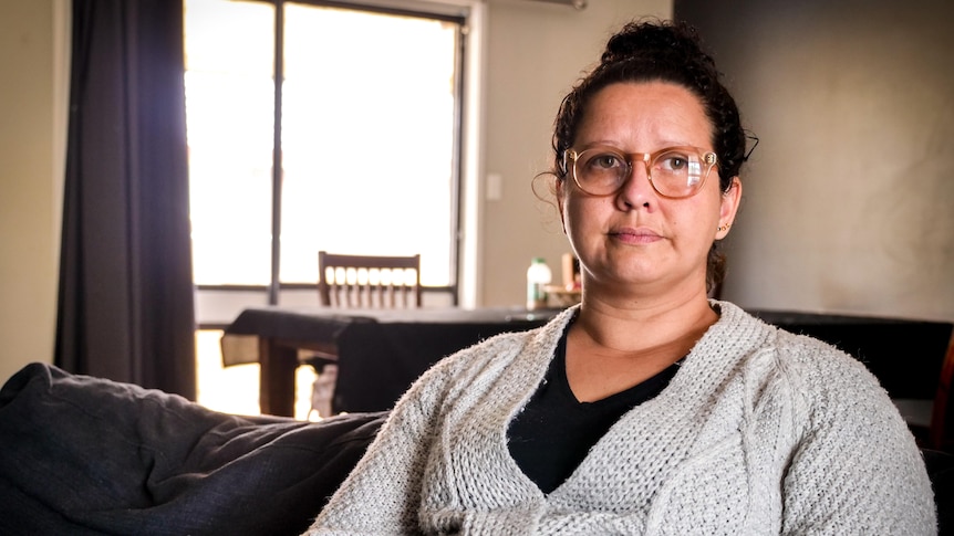 A woman sitting on a couch