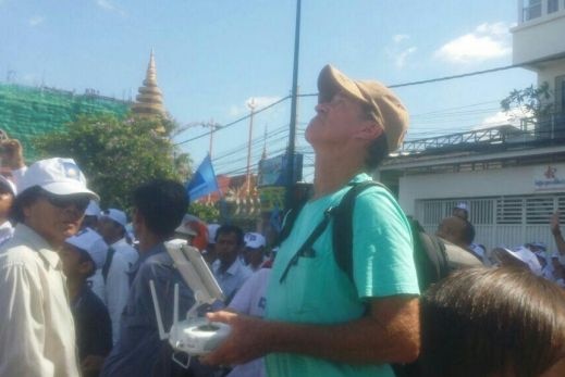 James Ricketson with a drone at a rally.