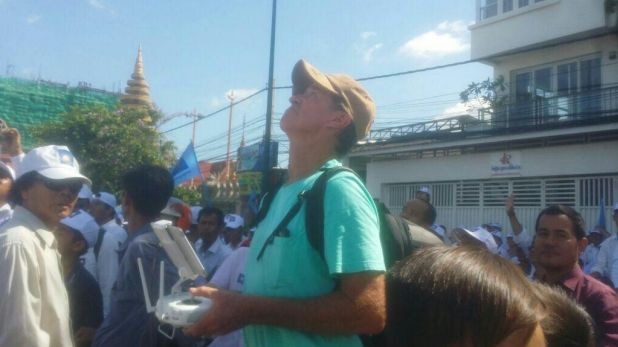 James Ricketson with a drone at a rally.