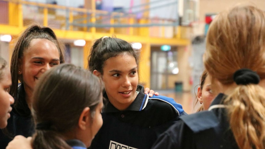 Indigenous girls play basketball at Balga Senior High School.