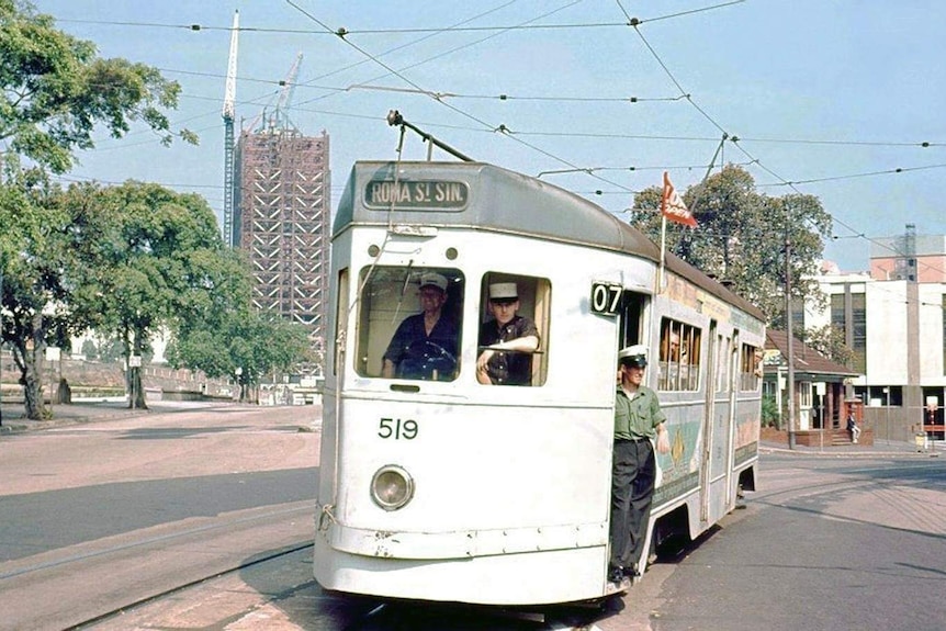A FM519 tram running through Brisbane CBD