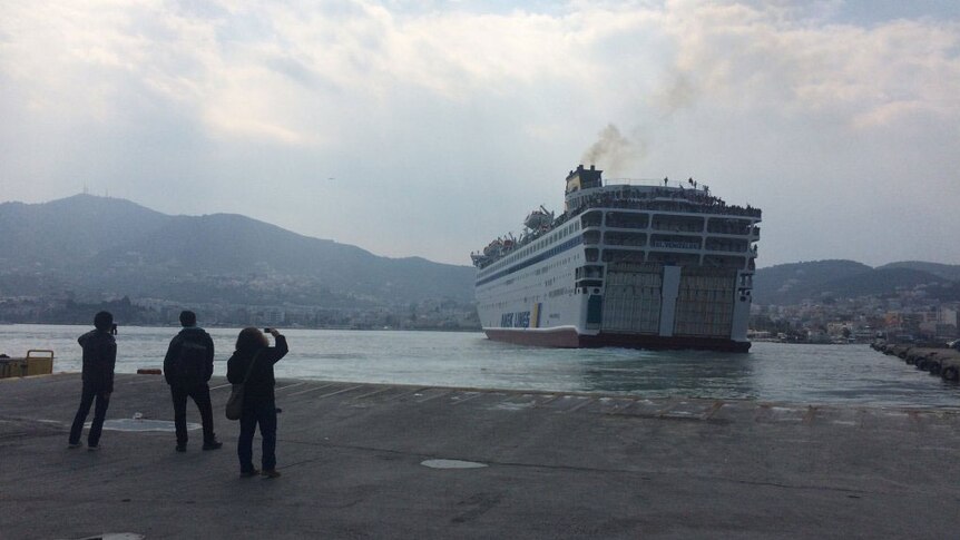 Ferry carrying asylum seekers leaves Greek island.