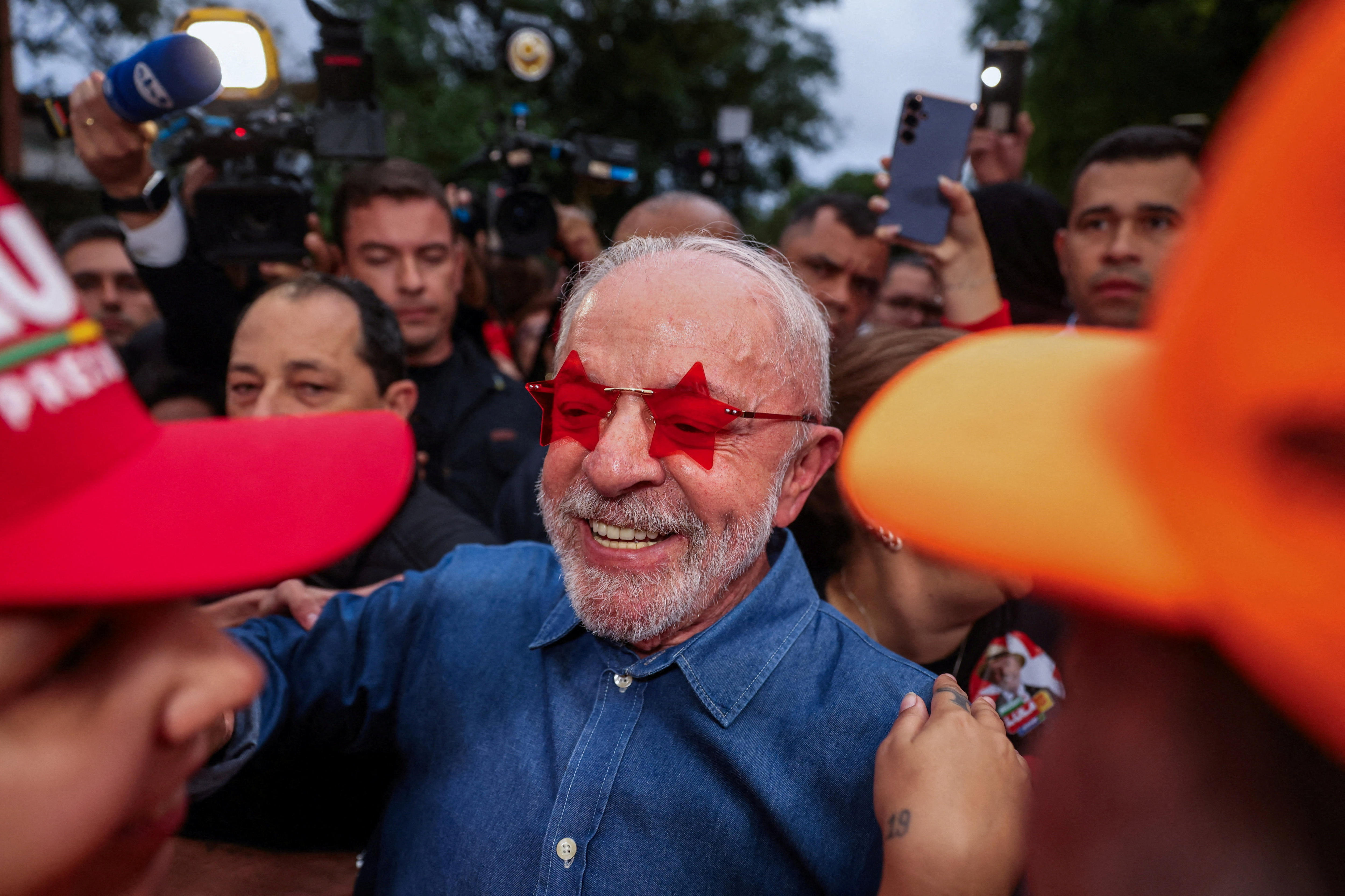 Lula celebrates unlikely victory in Brazil as Bolsonaro rejects results
