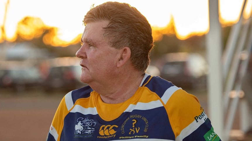 Man with rugby uniform