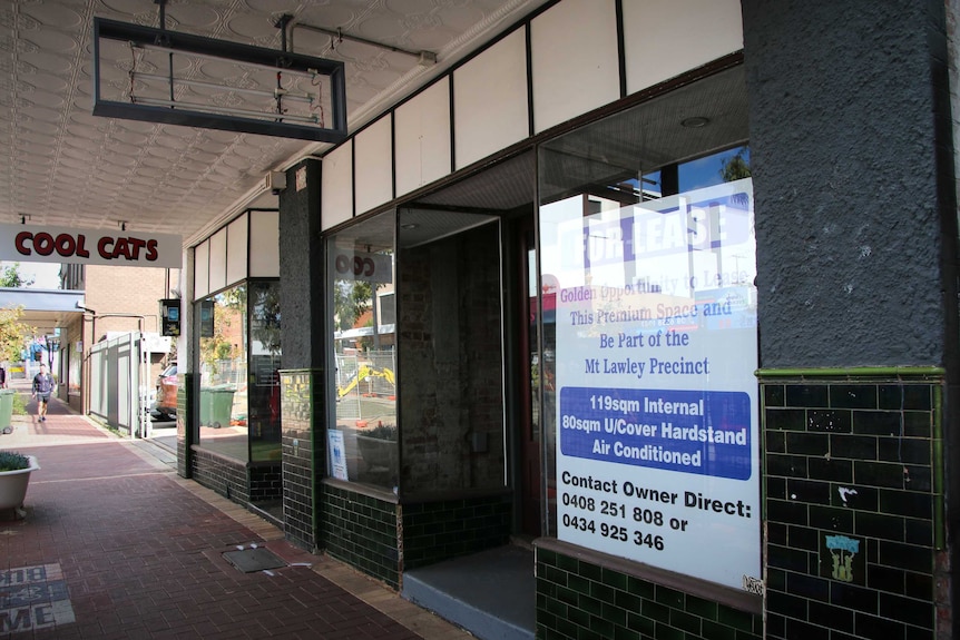 One of the many empty shops along Beaufort Street.