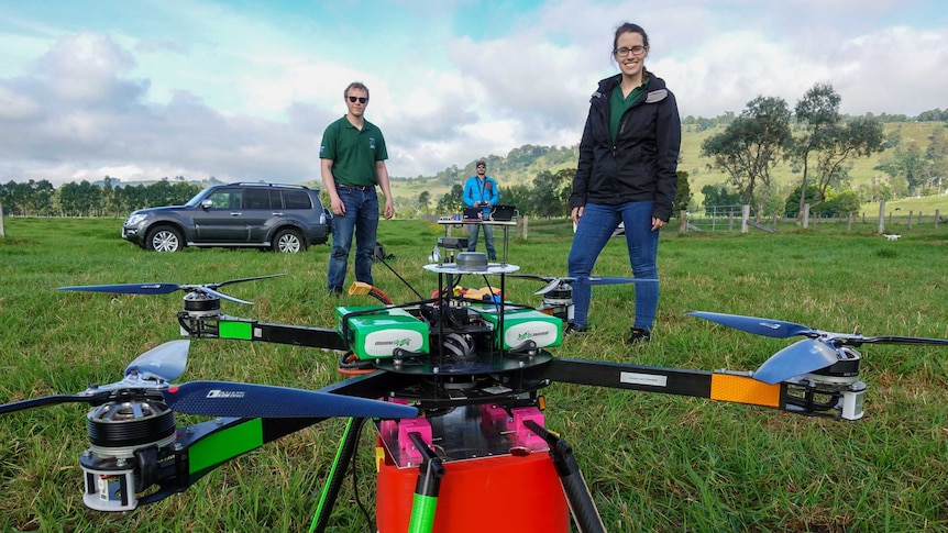 Dr Susan Graham and her team pose with their drone system.