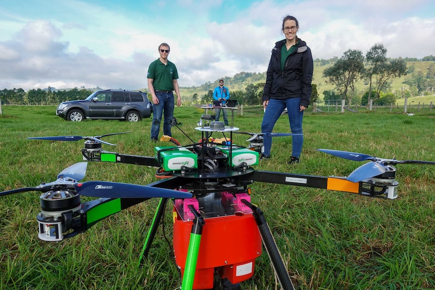 Dr Susan Graham and her team pose with their drone system.