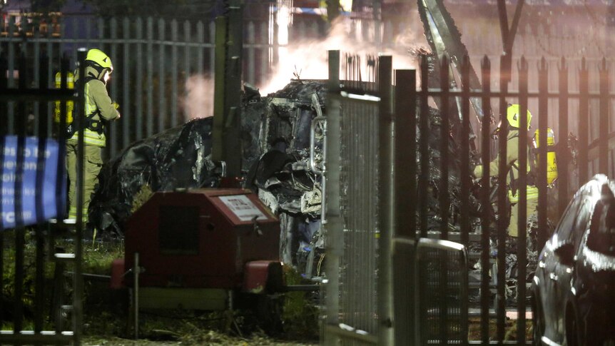 Crews attend to helicopter crash outside King Power Stadium