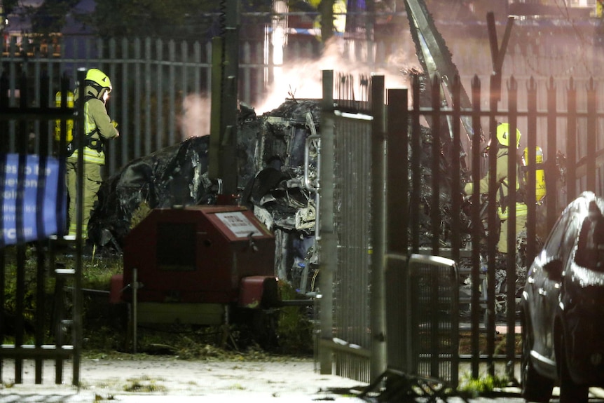 Crews attend to helicopter crash outside King Power Stadium