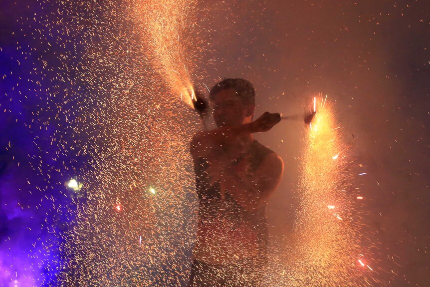 A fire dancer performs during New Year celebrations in metropolitan Manila.