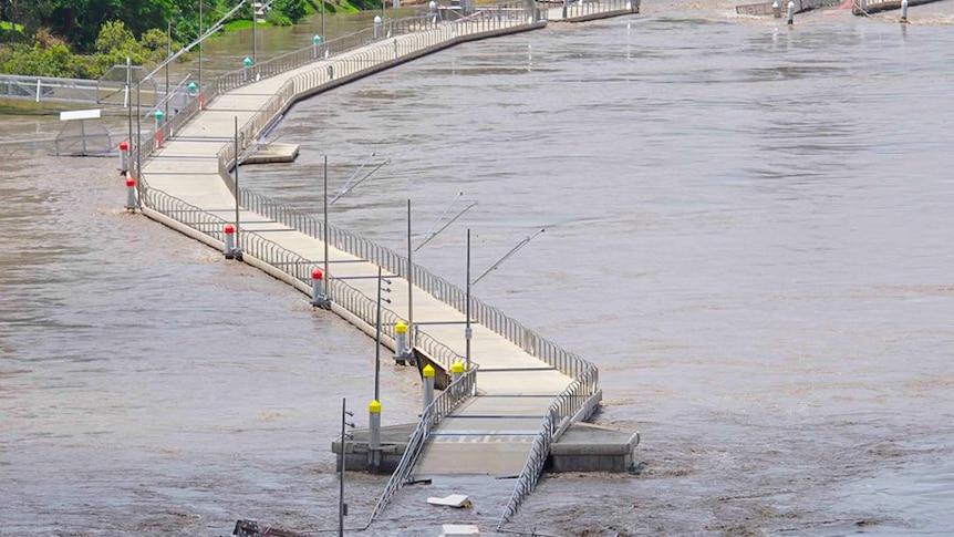 The Brisbane Riverwalk in flood during the 2011 weather event.
