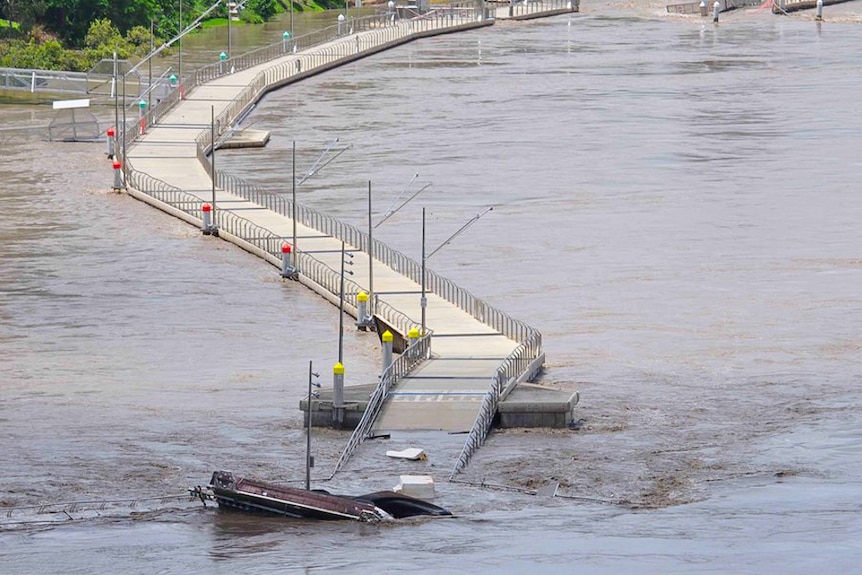 The Brisbane Riverwalk in flood during the 2011 weather event.