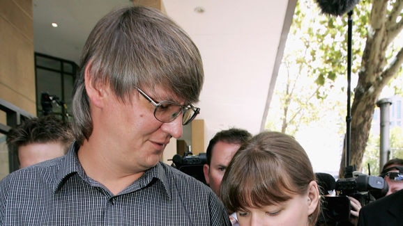 Mikhail Zubkov and his daughter Kateryna, holding hands, leave Melbourne Magistrates Court