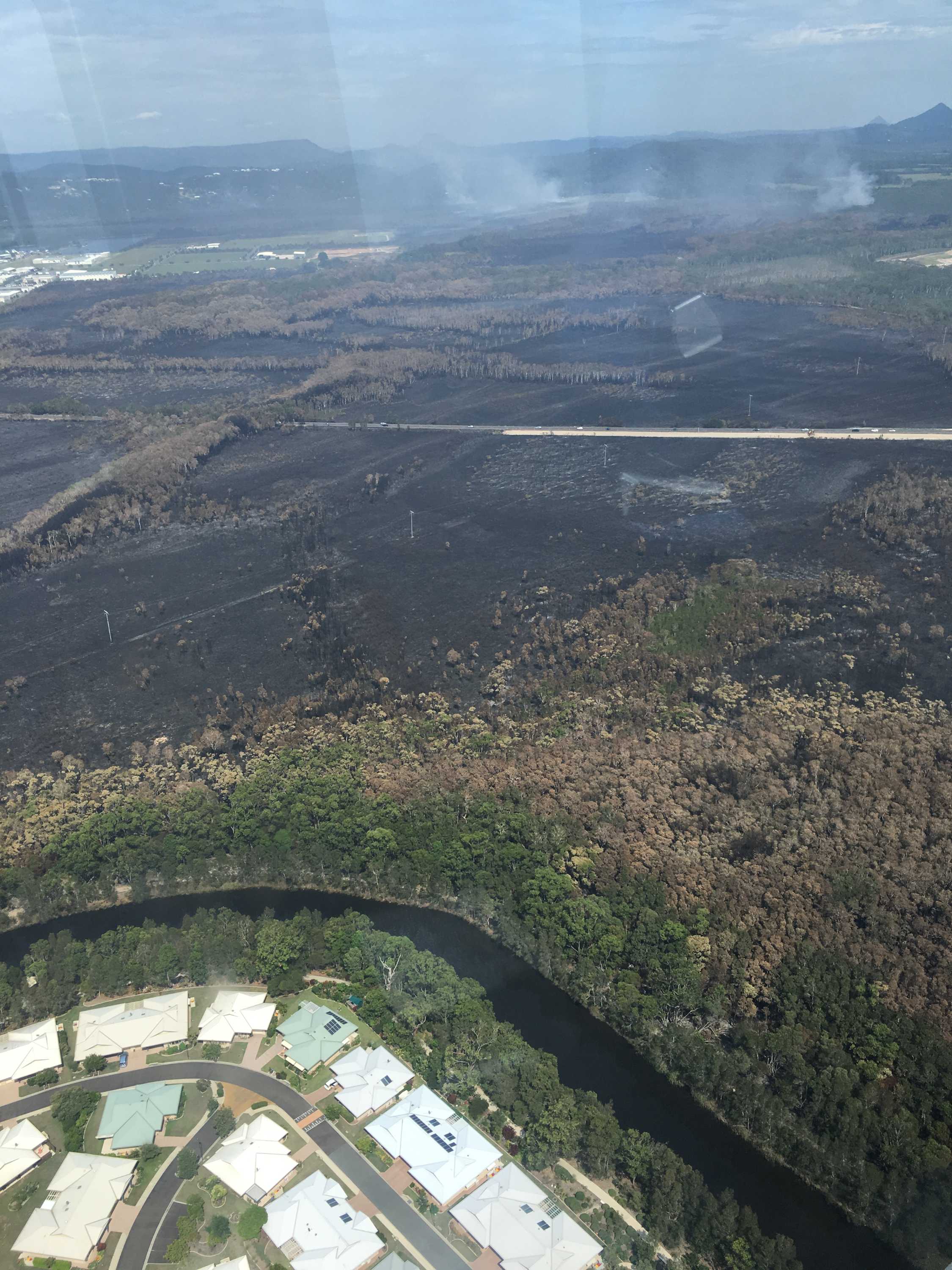 Sunshine Coast fire Rain helps firefighters contain Coolum blaze ABC