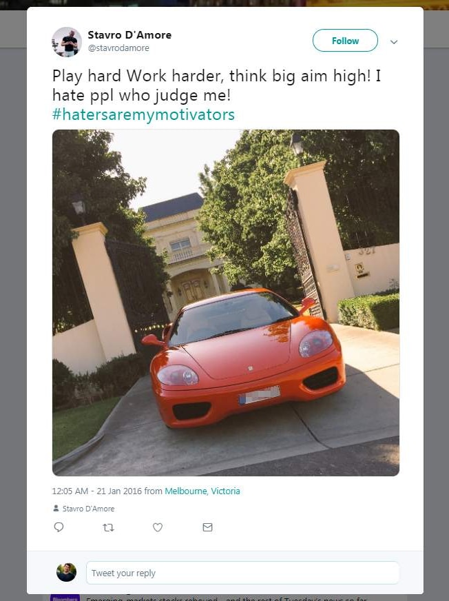 Screenshot of twitter post by Stavro D'Amore featuring red Ferrari sport car