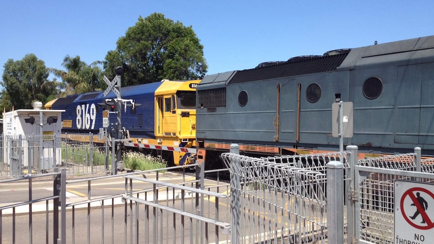 11:55am (AEDT). The last Pacific National coal train passes through Muswellbrook for 48 hours as industrial action begins.