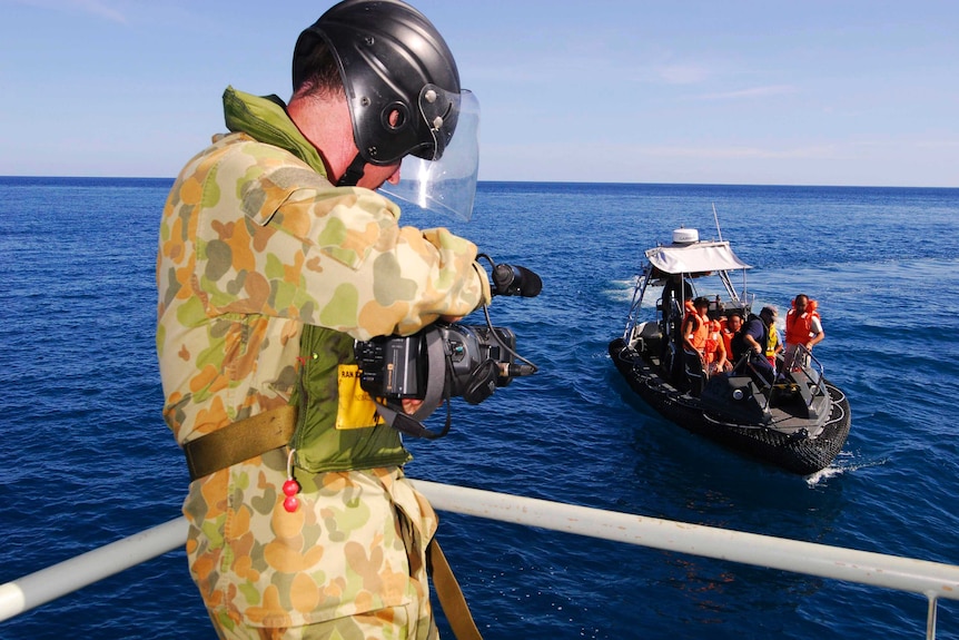 Defence personnel film asylum seekers