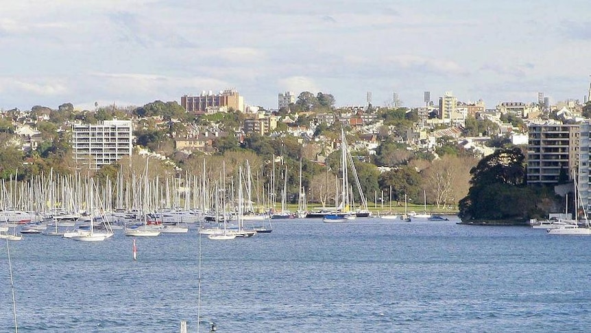 HMAS Huon at anchor in Sydney Harbour.