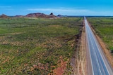 Dead straight road cuts through remote part of the country