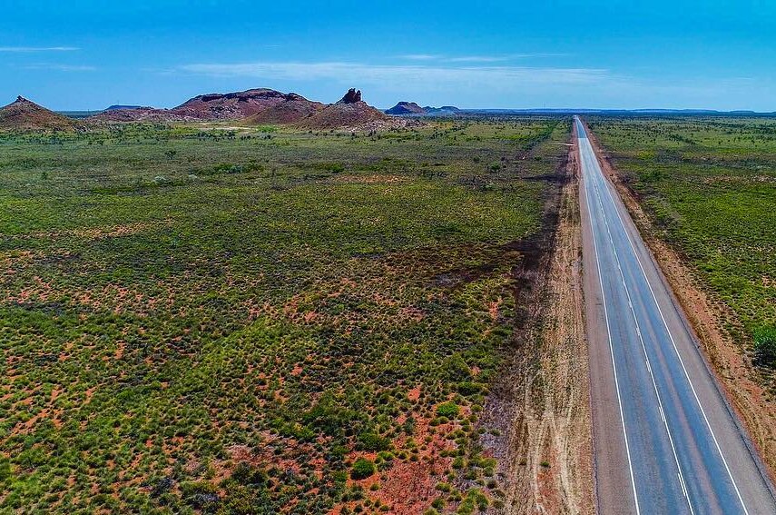 Dead straight road cuts through remote part of the country