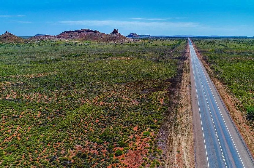 Dead straight road cuts through remote part of the country