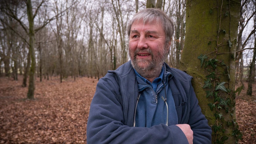 Mike Parker Pearson in the woods near Stonehenge