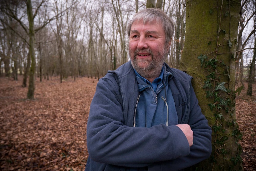 Mike Parker Pearson in the woods near Stonehenge