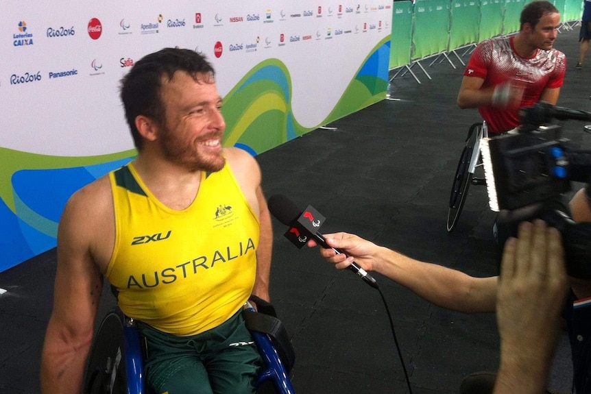 Kurt Fearnley speaks to Australian media in Rio.
