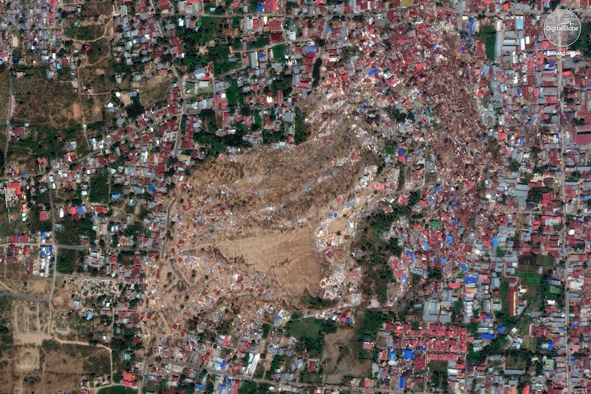 This October 1, 2018, satellite image provided by DigitalGlobe shows the Balaroa neighbourhood of Palu, Indonesia, after an earthquake and subsequent tsunami caused heavy damage to the area.