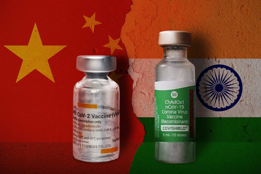Two vaccine bottles against the background of a Chinese and an Indian flag.