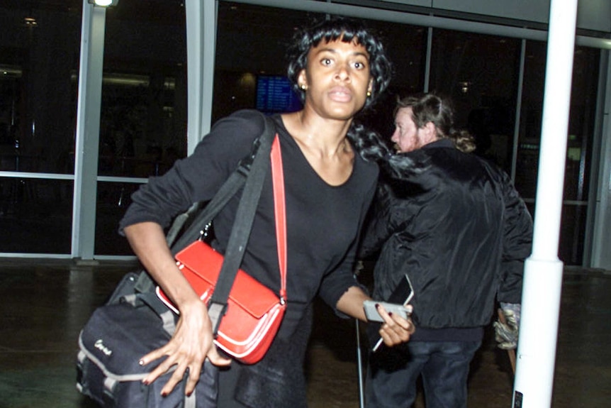 French 400m runner Marie-José Peréc arrives in Sydney for the Olympic Games.