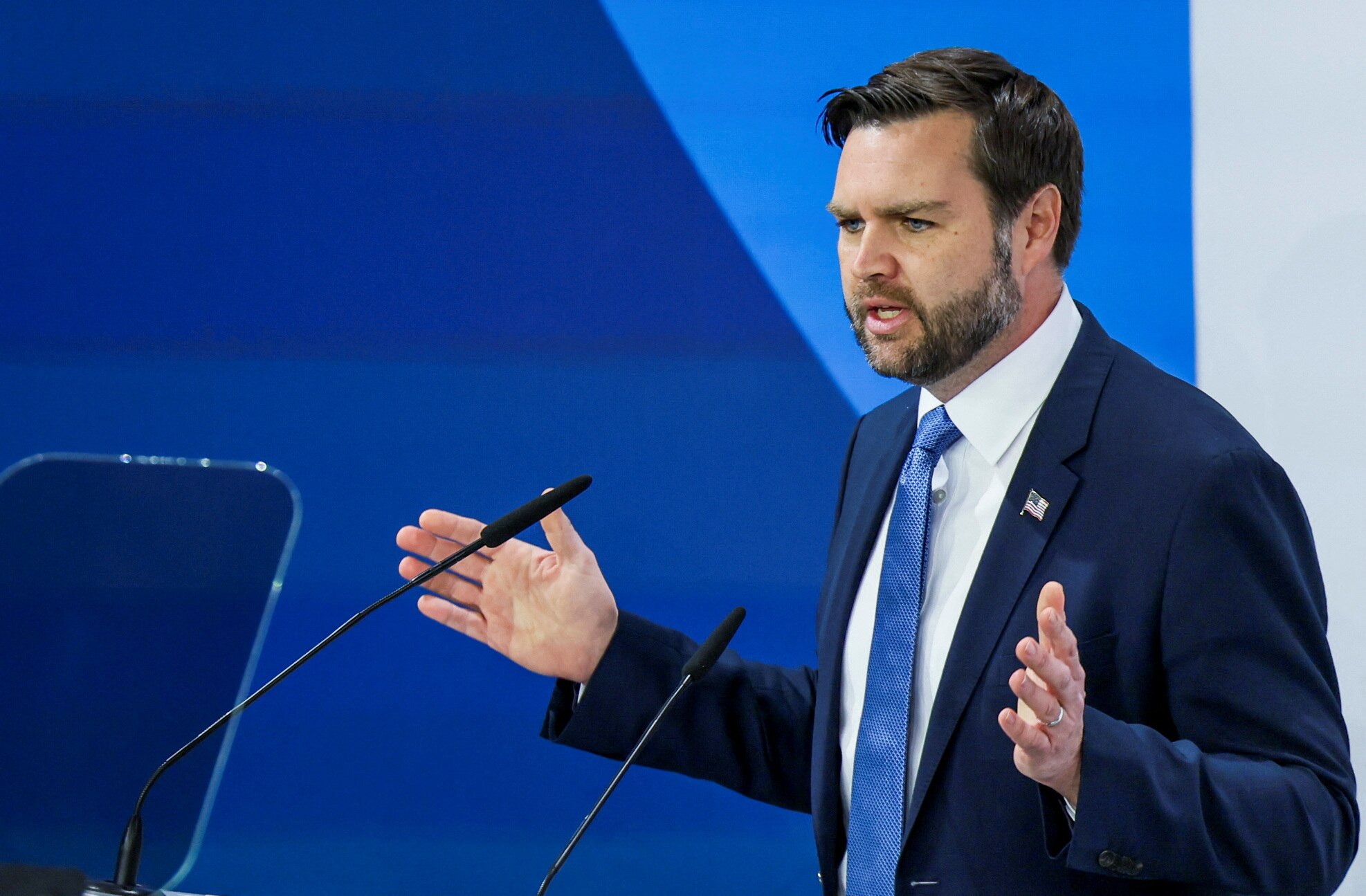 US Vice President JD Vance speaks at a lecturn in Munich