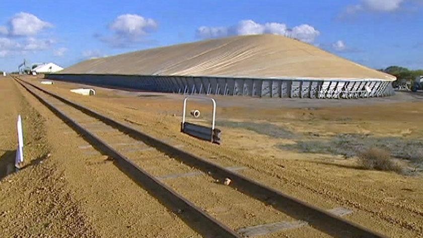 Outside a grain silo and rail line in WA's Mid West.