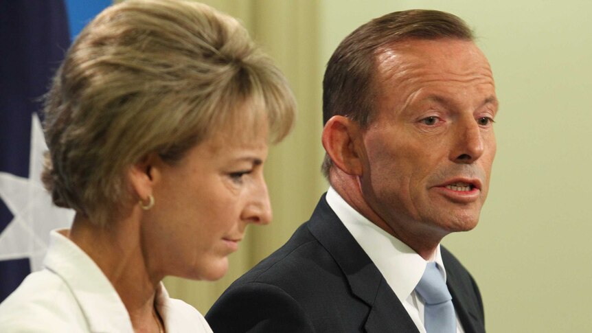 Michaelia Cash and Tony Abbott speak at a press conference.
