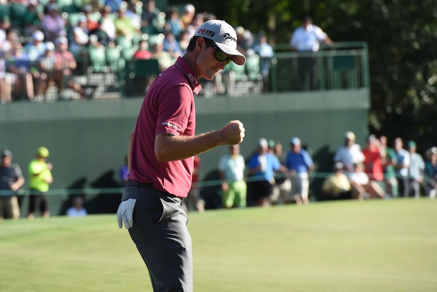 Justin Rose pumps his fist during the Masters third round