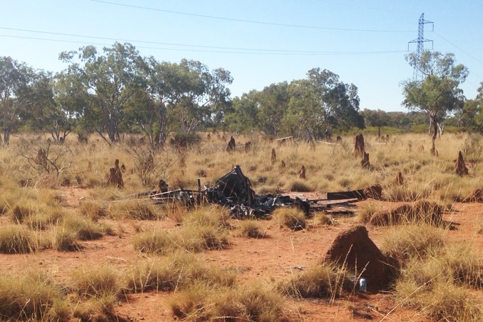 An outback helicopter crash, wreckage is completely destroyed.