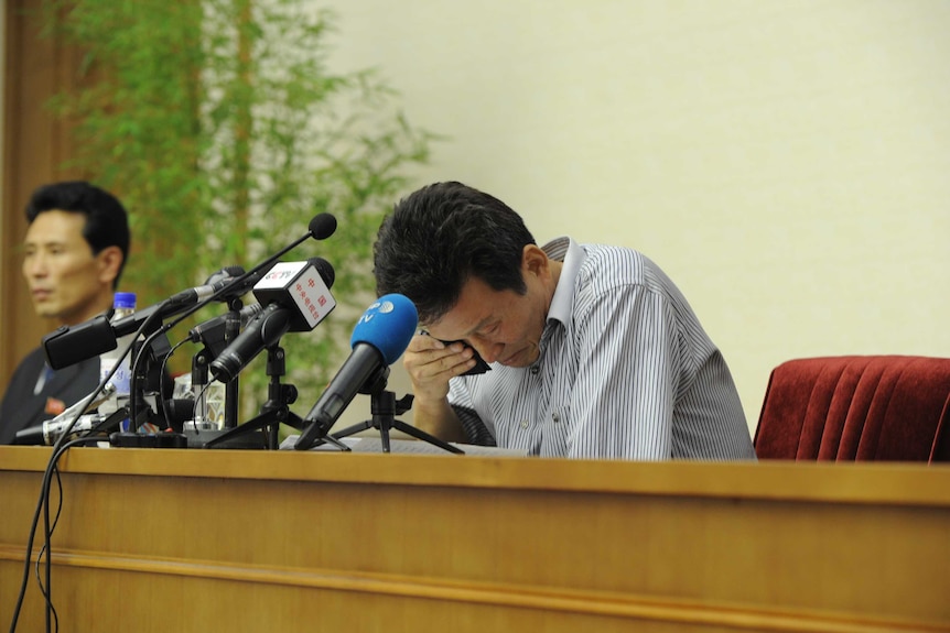 Ko Hyon-chol attends a press conference after being arrested in Pyongyang.