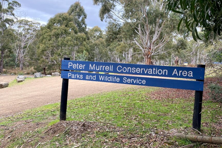  A sign in a park reads: Peter Morrell Conservation Area