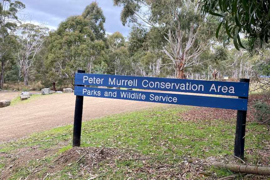  A sign in a park reads: Peter Morrell Conservation Area