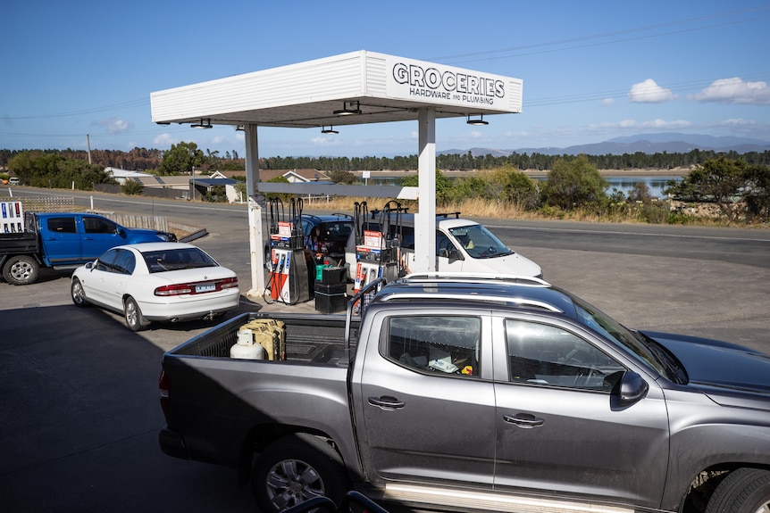 Cars in a petrol station.