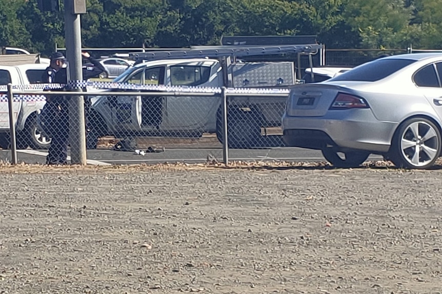 A car with police next to it