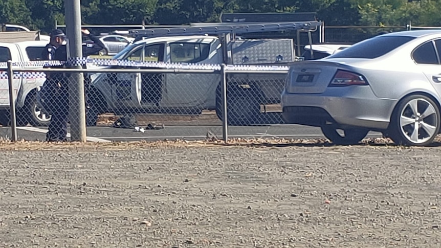 A car with police next to it