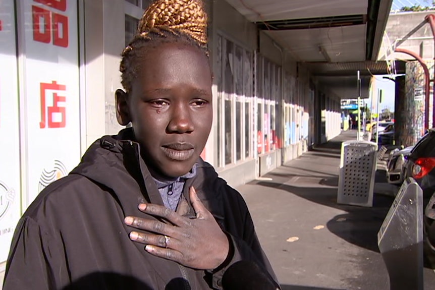 Victoria Abul Den with a tear in her eye talking about Sudanese gangs in Melbourne
